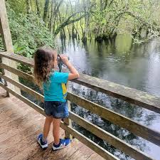 Family walking together on a Southwest Florida nature trail